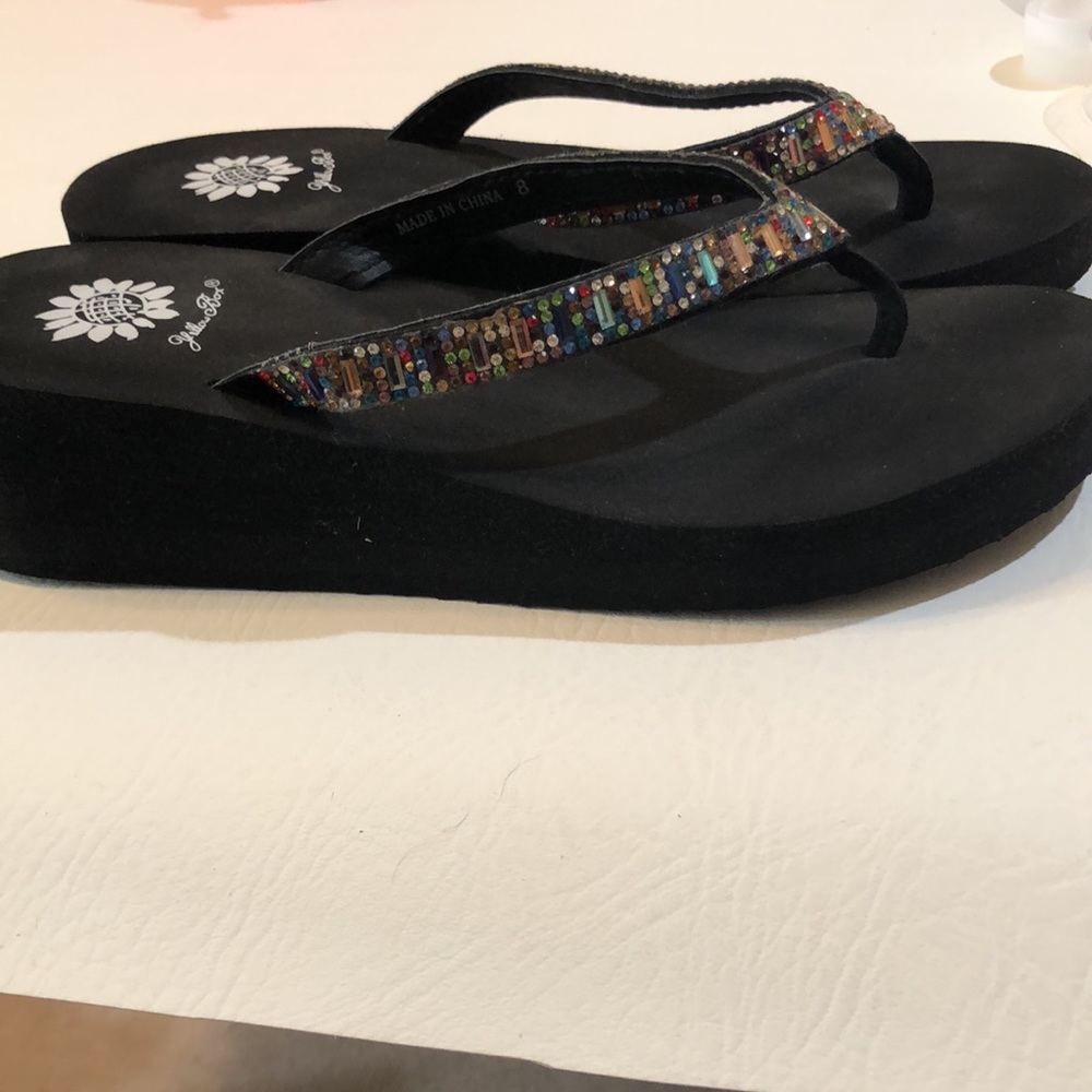 Yellow box flip flops